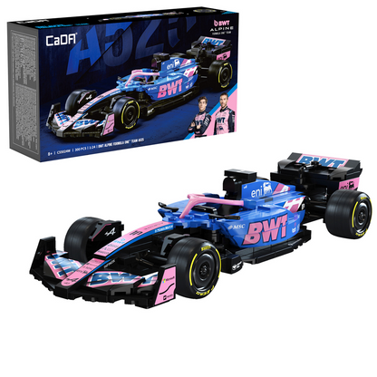 CaDA BWT Alpine F1 Team. Model racing car with pink and blue design on a white background