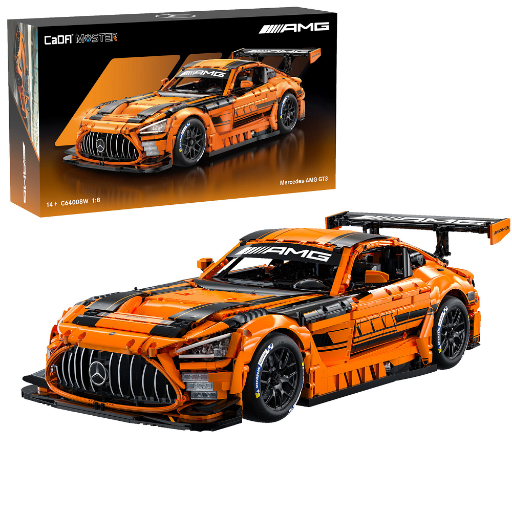 Orange and black model car with AMG branding next to its packaging on a white background