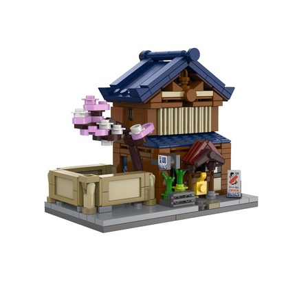 Toy building set with a traditional design on a white background. CaDA Mini Japanese Sento Bathhouse 352 piece Japanese building brick kit