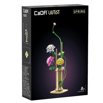 CaDA artisan Spring brick kit packaging with floral design on a black background