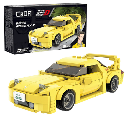 Yellow toy car model with packaging featuring a character on a white background