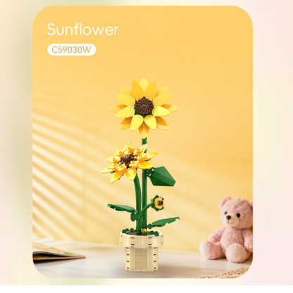 CaDa Sunflower. Sunflower model with a teddy bear on a yellow background
