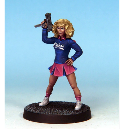 Crooked Dice Armed Cheerleader. Figurine of a character in a blue 'Rebels' shirt and pink skirt holding a gun on a blue background