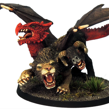 Model of a dragon and a creature with red head on a white background. Crooked Dice Chimera resin fantasy monster miniature lion goat serpent hybrid