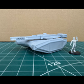 Model spaceship and figure on a ...