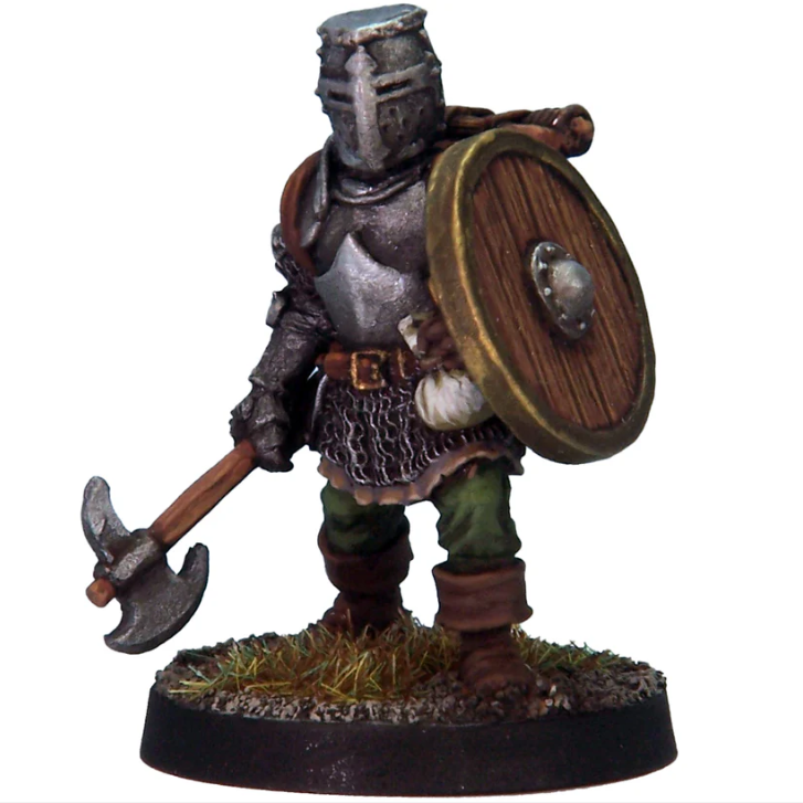 Miniature figure of a warrior in armor with a shield and axe on a white background