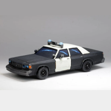 Model police car on a grey background. Crooked Dice Police Squad Car resin vehicle miniature 115mm tabletop police car model with siren options unpainted