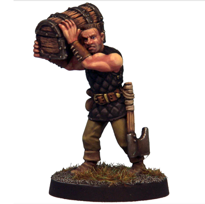 Crooked Dice Porter. A 30mm white metal miniature hand-sculpted by Ian Mountain. Features quilted jerkin, battle-axe, and chest. Supplied unpainted.

