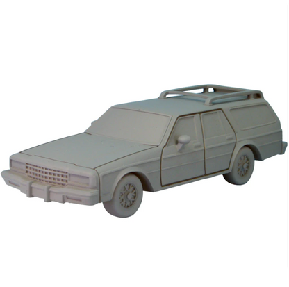 Model of a car on a white background. Crooked Dice Station Wagon resin vehicle miniature 110mm tabletop car model unpainted