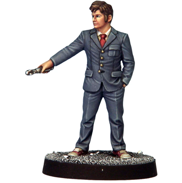 Statue of a man in a grey suit with a red tie on a white background. Crooked Dice Temporal Traveller 10 white metal sci fi time traveller miniature with 25mm slotta base unpainted