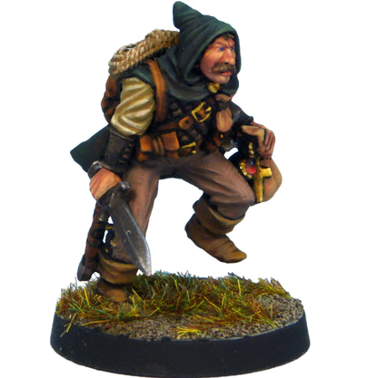 Crooked Dice Thief Hooded With Loot. Miniature figurine of a character in fantasy attire with a weapon on a white background