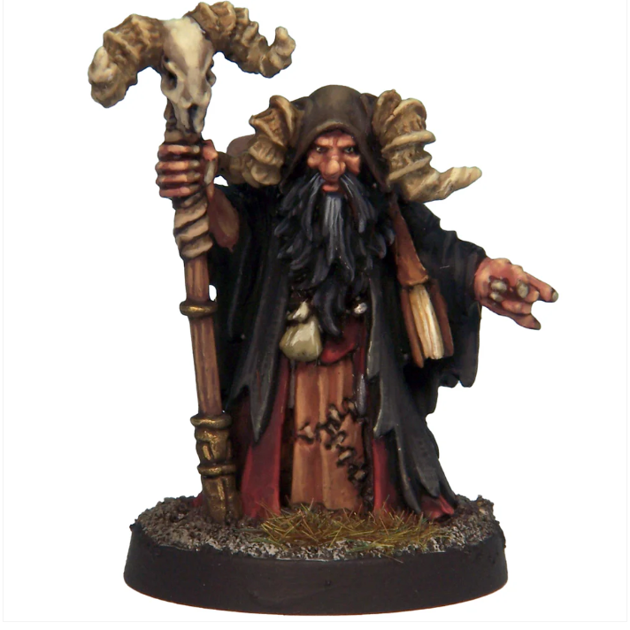 Crooked Dice Warlock. A 26mm white metal miniature featuring an evil magic-user with a rams-horn headdress and magical staff. Supplied unpainted with a 25mm slot base
