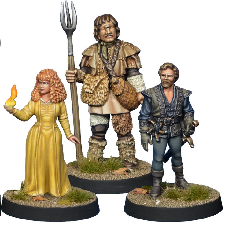 Dark Fortress Stars by Crooked Dice, a pack of three white metal miniatures for your tabletop games representing characters from 80's classic movie, can these heroes storm the Dark Fortress? This pack includes a princess in a long dress with curly hair and fire in her hand, a prince dressed in finery with a sword on his hip and a cyclops holding a pitchfolk