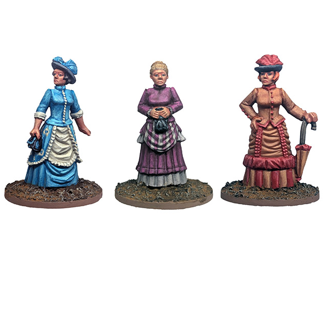 Three painted historical female figurines standing on round textured bases against a plain white background. The left figure wears a bright blue dress and hat with cream apron details; the center figure wears a purple dress with a grey apron; the right figure wears a reddish-brown dress with a pink hat and holds a black umbrella. Dead Man's Hand Ladies Mrs Evelyn Harper Amy Fotherington and Miss Evansa 28mm metal miniatures