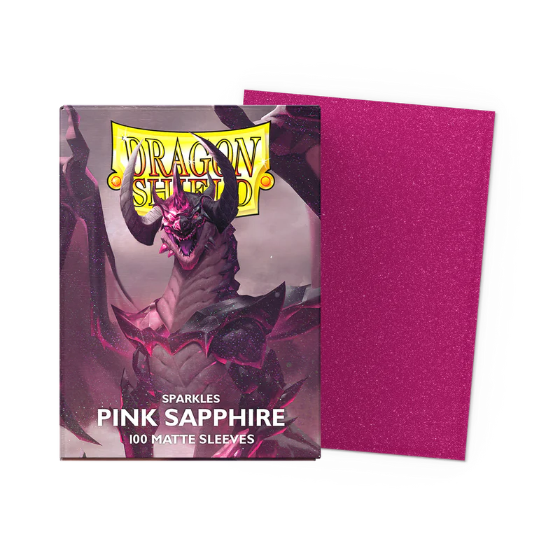 Dragon Shield pink sapphire card sleeves with packaging on a white background. Dragon Shield Sparkles Pink Sapphire Matte Sleeves