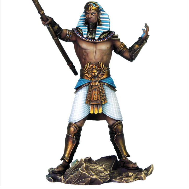 An Egyptian-style god holding a staff, wearing metal leg and arm guards, an ornate belt, and headdress, standing approximately 80mm tall, cast in resin.