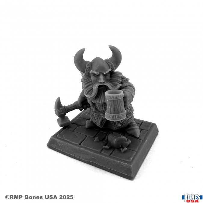 Dwarven Hero (30216). A bold Bones USA miniature featuring a dwarf warrior with an axe and tankard, standing on a textured base. Multipart, unpainted.
