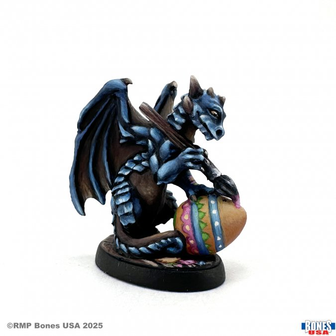 Easter Egg Dragon (30194). A delightful Bones USA miniature featuring a whimsical dragon painting an Easter egg. Perfect for RPGs, dioramas, and collectors.
