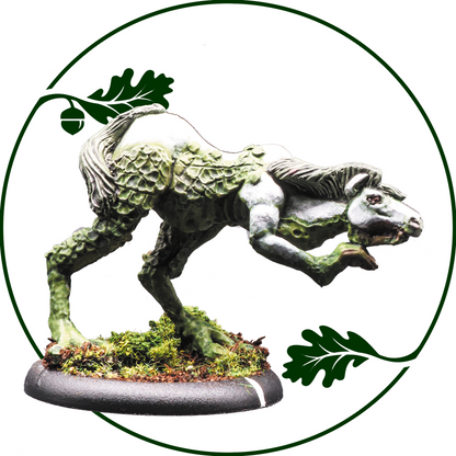 A painted fantasy creature miniature, likely a stag or deer-like beast, shown in a crouching pose on a textured mossy base. The figure is covered in green moss-like texture with brown and gray  weathered areas. Fenfolk Kelpie by Oakbound Studio 