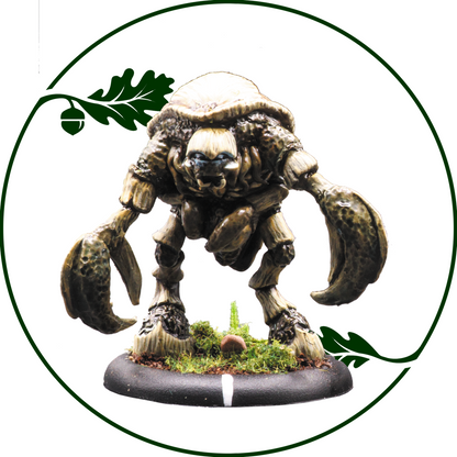 A painted fantasy creature miniature with a shell-like helmet, four legs, and large clawed hands, standing on a mossy circular base. The figure is centered inside a green circular border with oak leaf and acorn graphics on a white background. Fenfolk Woldlouse by Oakbound Studio