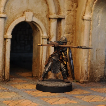 Female fighter miniature in plate armour with shield, sword, and spear options. White metal fantasy figure for RPGs and wargames. Supplied unpainted.