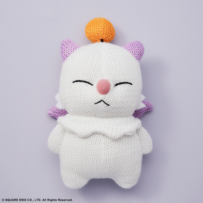 Final Fantasy Knitted Plush – Moogle. White plush toy with purple accents on a light grey background