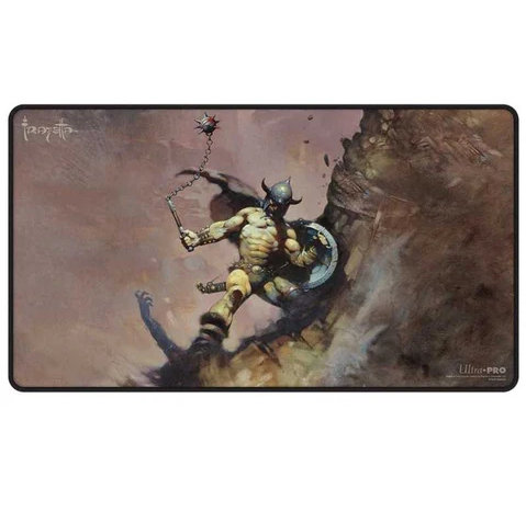 A rectangular gaming playmat featuring fantasy artwork of a horn-crowned warrior swinging a mace on a rocky cliffside, with the Tarketo logo in the top-left and Ultra PRO branding in the bottom-right. Frank Frazetta Warrior with Ball and Chain Black Stitched Playmat