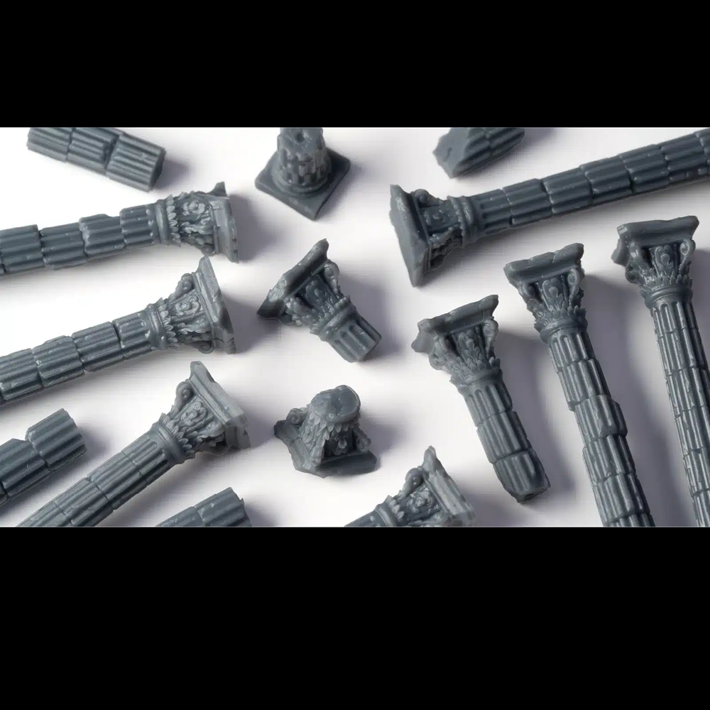 Gamers Grass Ancient Columns. Collection of grey architectural model pieces on a white background