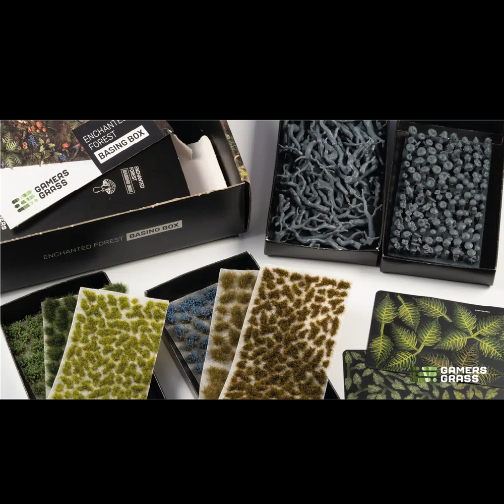 Gamers Grass Enchanted Forest Basing Box contents overview. Collection of gaming terrain pieces and packaging with 'Gamer's Grass' branding.