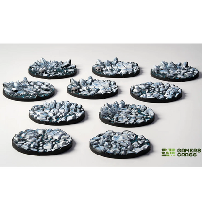Gamers Grass Frost Lake Base Toppers - 28mm Round. Set of round, textured game bases with a rocky surface on a white background, featuring the brand 'GAMERS GRASS'.