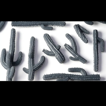 Gamers Grass Saguaro Cacti Grey cactus-shaped candies on a white background