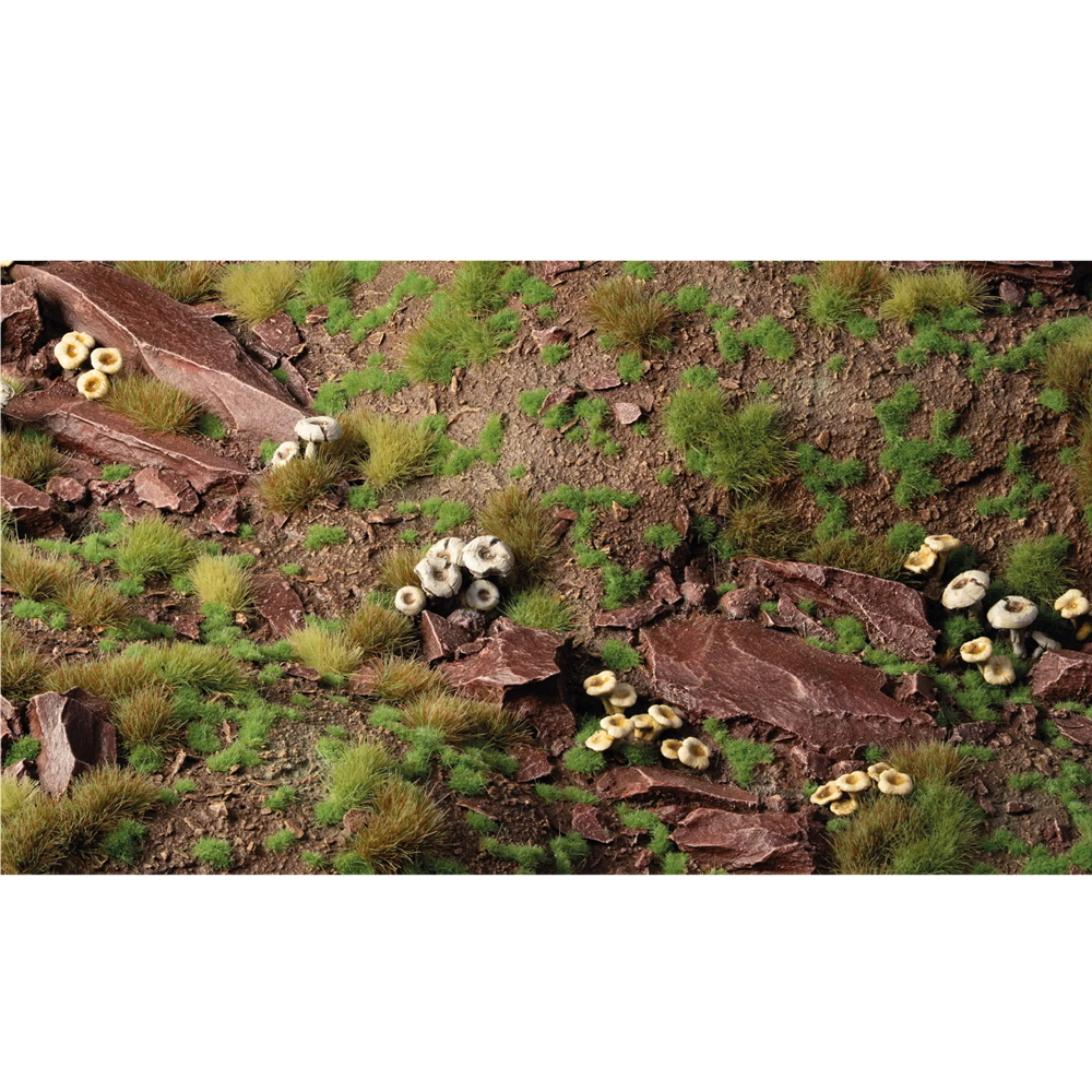 Gamers Grass Tiny Strong Green 1mm Tufts. 500 self-adhesive miniature grass tufts for forests, meadows and scenic basing.
