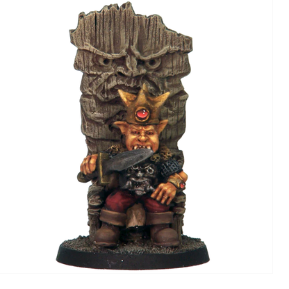 Goblin King by Crooked Dice, a resin miniature for your tabletop games representing a Goblin sitting in a throne wearing a crown and holding a knife across his teeth