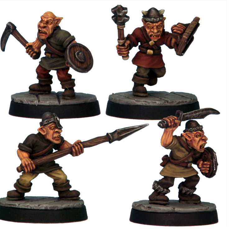 Goblin Warriors 3 by Crooked Dice, a pack of four white metal miniatures for your tabletop games representing characterful goblins in various clothing. These short, wicked and leathery skinned foot soldiers are carrying various weapons including a polearm, sword and an axe