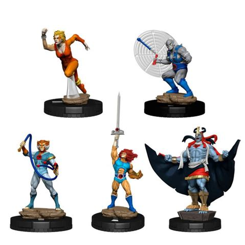 Five small illustrated fantasy character miniatures on black circular bases, arranged on a plain white background. The figures show varied poses and colors: orange, blue, grey, red, black, and silver details. HeroClix Iconix ThunderCats