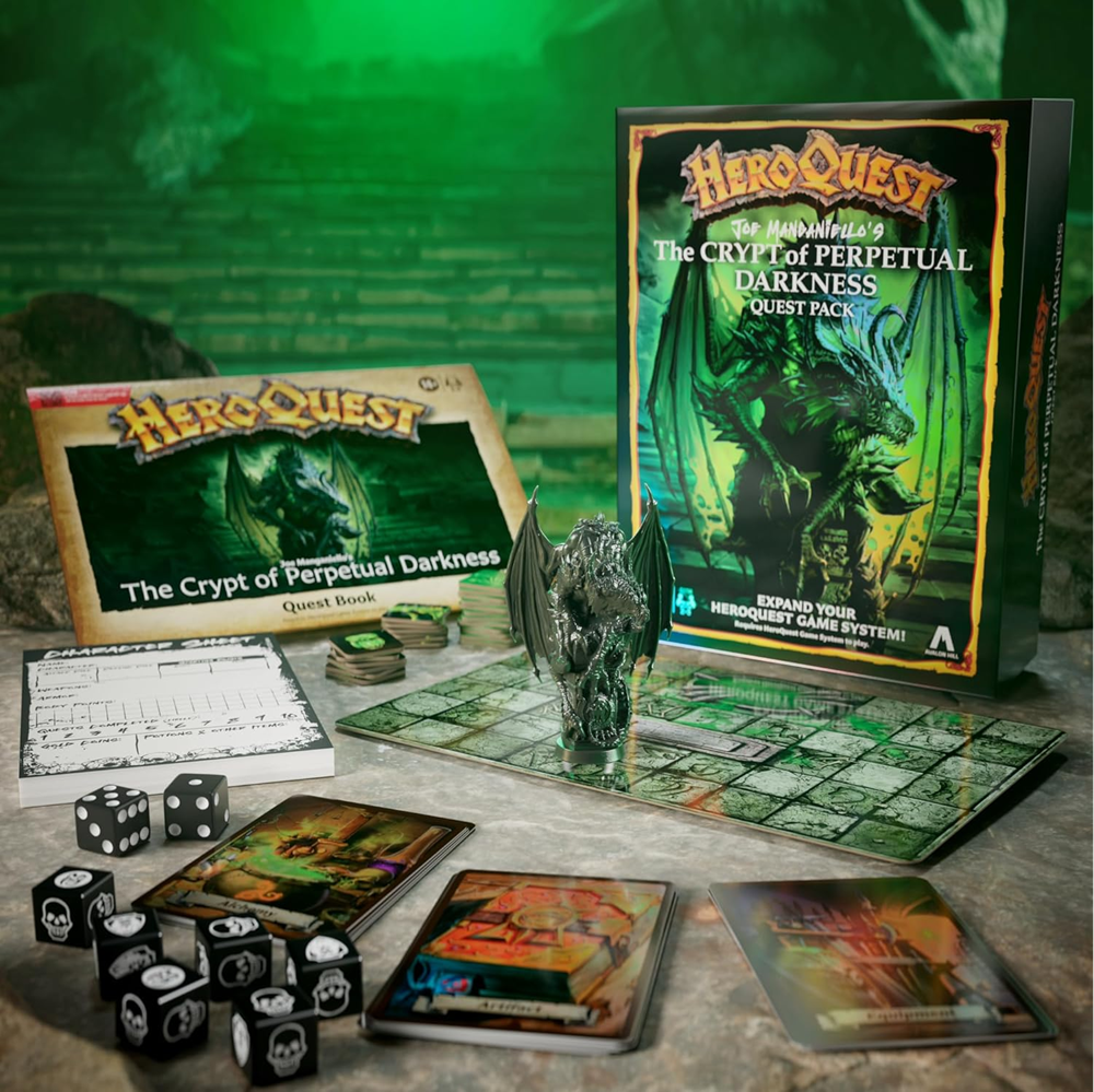 HeroQuest game components including board, cards, dice, and packaging on a textured surface with green background.