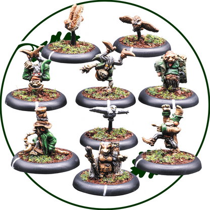 A set of nine painted fantasy tabletop miniatures arranged in a circle on round black bases, isolated on a white background with a thin green circular outline. Hillfolk Warband by Oakbound Studio
