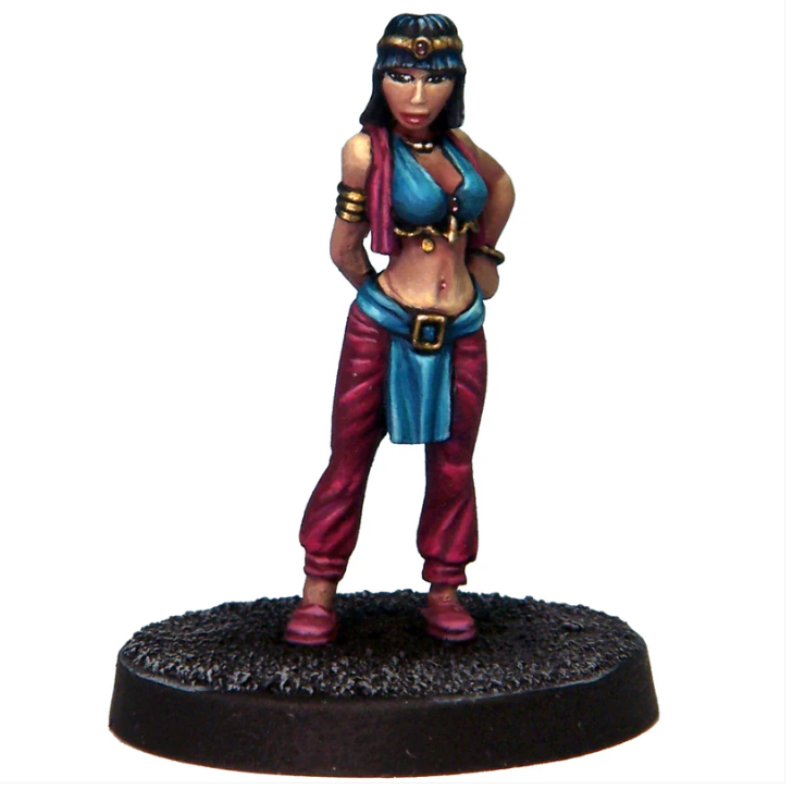 Kailila Harem Assassin by Crooked Dice, a white metal miniature for your tabletop games. This female miniature is wearing a belly dancer style outfit and hides a blade behind her back
