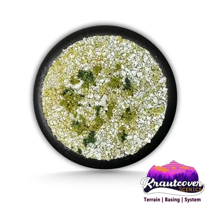 Pot of Pride of the Riddermark basing mix showing a blend of fine stones, gravel, turf and grass fibres in earthy colours for miniature bases and dioramas.