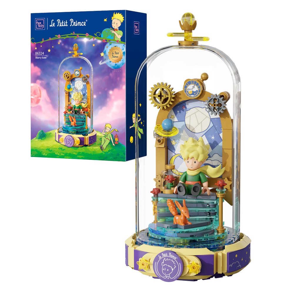 Le Petit Prince toy figure in a glass dome with packaging on a white background. Le Petit Prince Eternity Series Starry Gate brick model kit