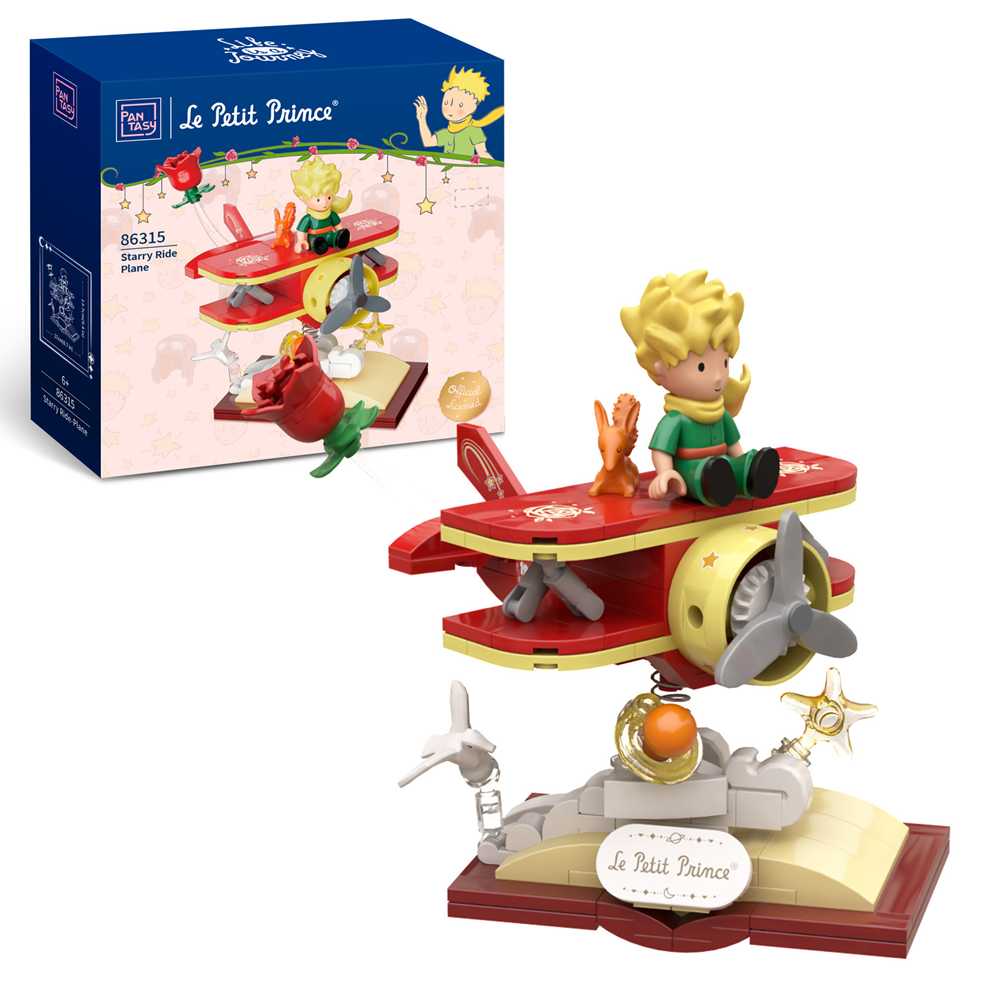 Toy figure of 'Le Petit Prince' on a red airplane with packaging in the background. Le Petit Prince Starry Ride Plane brick model