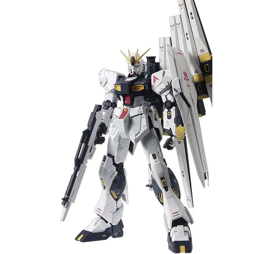 A white, black, and gold Gundam action figure holding a rifle and a large shield, photographed against a solid white background. MG Gundam Nu Ver Ka 