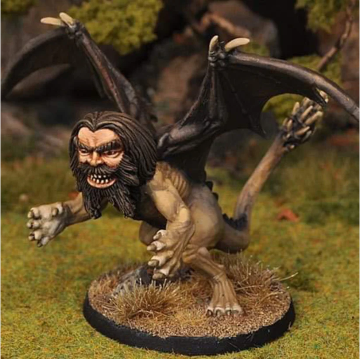 Manticore B by Crooked Dice, a resin miniature for your tabletop games representing a Manticore, a fierce creature with a human face and long hair, lions body and bat wings