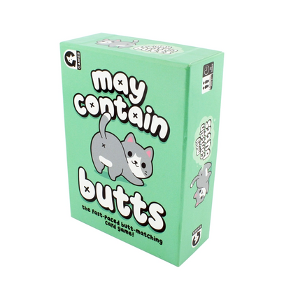 The game box for 'may contain butts' on a plain white background. The box is mint green with a cartoon gray and white cat and bold white text with black outlines. 
