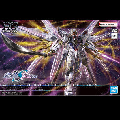 Bandai Namco HG Cosmic Era Mighty Strike Freedom Gundam model kit box art, featuring a detailed white and silver Gundam figure with a large sword and energy effects against a cosmic purple and gold background. Mighty Strike Freedom Gundam - HG 1/144 Gundam Bandai
