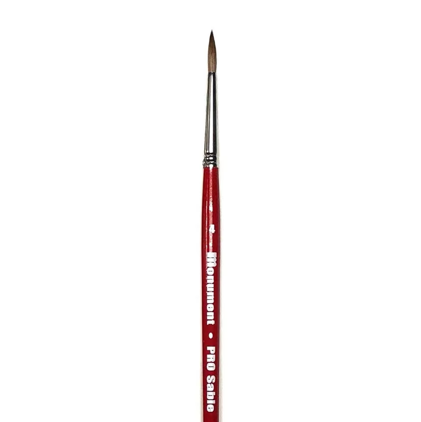 A fine detail paint brush with a red handle, silver ferrule, and brown bristles, featuring white text that reads 'Monument PRO Sable' on a plain white background. Monument Hobbies PRO Sable Paint Brush Round 4