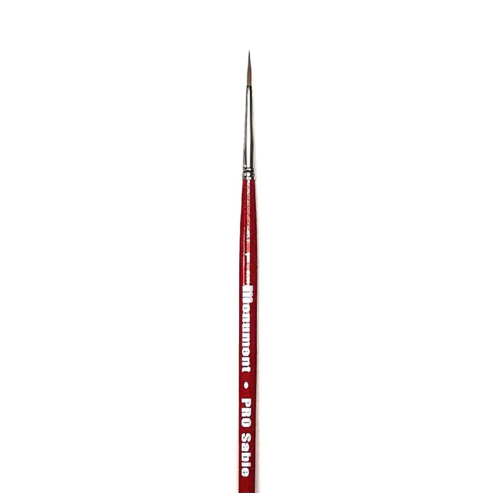 A single fine detail paint brush with a red handle and silver ferrule, featuring white text that reads 'Monument PRO Safe'. Monument PRO Sable Round Size 1 paint brush for miniature painting