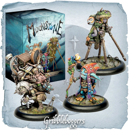 Painted tabletop miniatures and their box art for the game Gribbleboggers, featuring a steampunk goblin and a colourful blue-skinned creature on black bases against a textured light grey background. Moonstone Gribbleboggers Troupe Box with three Goblin resin miniatures