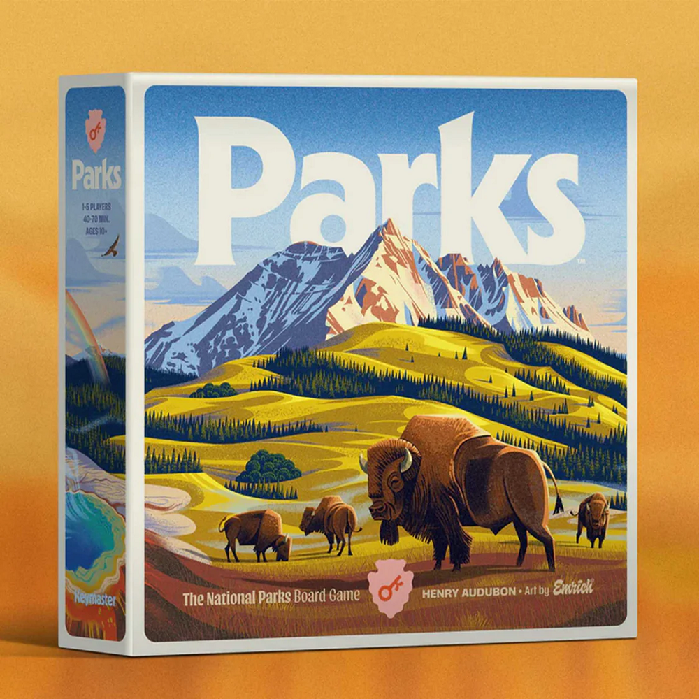 Board game box titled 'Parks' with mountain and bison illustration on a yellow background