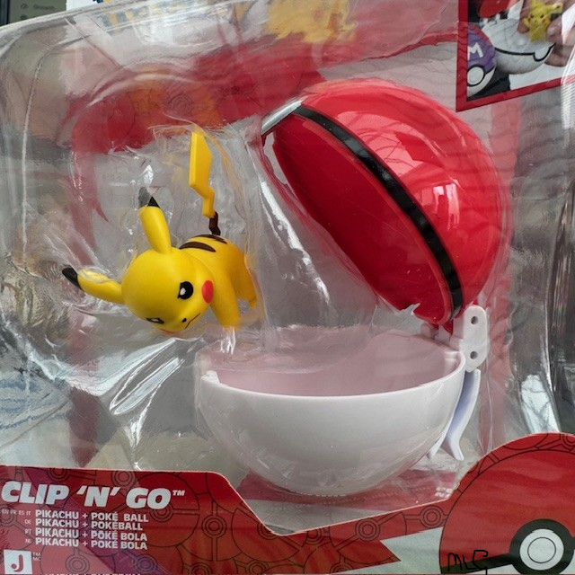 Packaged Pikachu Clip 'N' Go toy set featuring a yellow Pikachu figure, a red Pokéball, and a white egg inside a clear plastic blister package with retail card backing. Pokémon Clip 'N' Go Pikachu Poke Ball Figure Set